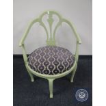 A painted elbow chair