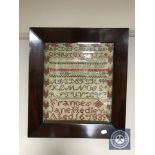 An early Victorian mahogany framed sampler by Frances Jane Hedley, aged 16,