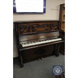 An early 20th century oak upright piano by James Smith & Son of Liverpool, width 146 cm.