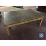 A large rectangular pine coffee table