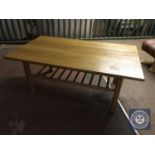 A refectory coffee table with two matching lamp tables