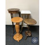 An antique inlaid plant stand together with a gilt and marble two tier plant stand and two others