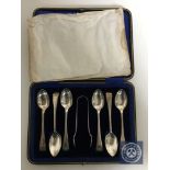 A set of six cased sterling silver teaspoons with sugar tongs