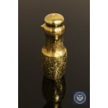 A good quality Victorian silver gilt scent bottle, with engine turned chased decoration,