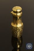 A good quality Victorian silver gilt scent bottle, with engine turned chased decoration,