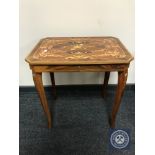 An inlaid musical occasional table