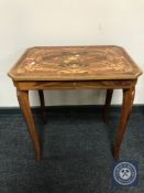 An inlaid musical occasional table