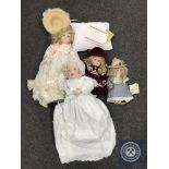 An ornamental lidded casket and A Victorian style Franklin doll together with three other dolls