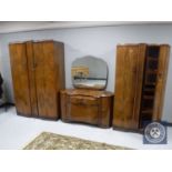 A three piece 20th century Shrager walnut bedroom suite