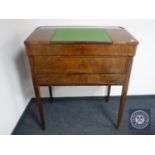 A 19th century continental mahogany clerk's desk CONDITION REPORT: Numerous