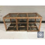A triple section canary bird cage