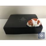 A Royal Crown Derby Collector's Guild paperweight, Puppy, with gold stopper, boxed.