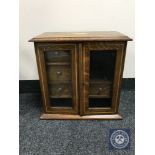 A Victorian inlaid oak smoker's cabinet