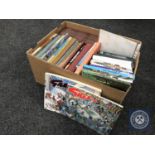 A box containing mid 20th century annuals, Giles cartoon books,