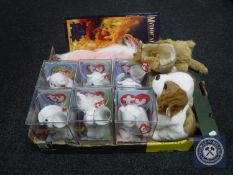 A box containing TY beanie babies and soft toys together with a Mythical Creatures jigsaw book