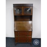 A mahogany bureau bookcase