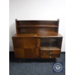 A mid twentieth century teak sideboard