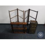 A set of mahogany wall shelves together with two folding towel rails and brass embossed stick stand