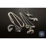 A collection of silver jewellery to include two pendants and four brooches