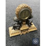 A continental gilt eight day mantel clock