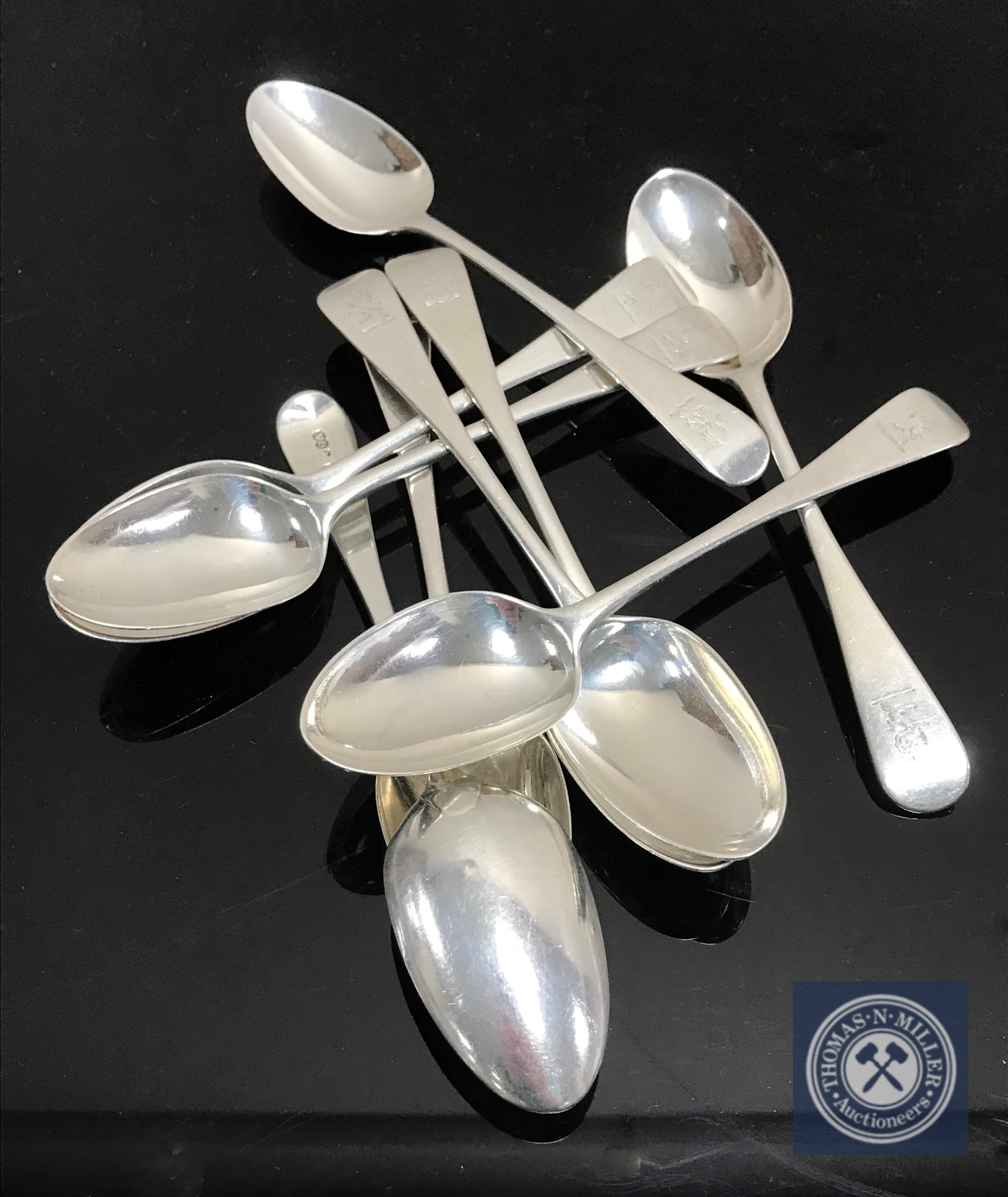 A set of nine silver teaspoons