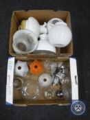 Two boxes of vintage oil lamp parts, glass shades etc.