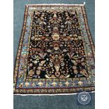 An antique Persian Feraghan rug,