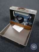 A mid twentieth century cased electric sewing machine (continental wired)