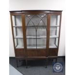 An Edwardian inlaid mahogany break-front display cabinet