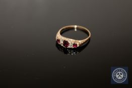 An antique ruby and diamond ring, size M, 2g.
