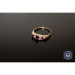 An antique ruby and diamond ring, size M, 2g.