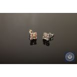 A pair of 18ct white gold diamond earrings