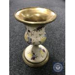 A Victorian brass and pottery oil lamp base