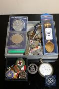 A collection of enamelled Women's Institute medals, crowns,