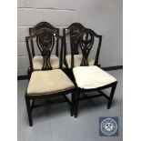 A set of four mahogany Hepplewhite style dining chairs