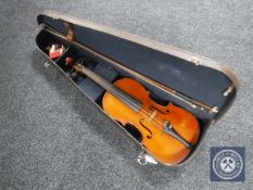 A 20th century Stradivarius copy violin and bow in case