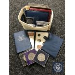 A tub containing a collection of crowns, decimal coin set, Australian Mint coin set,