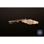 A 9ct gold peridot bar brooch,