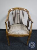 A Victorian inlaid mahogany tapestry seated armchair