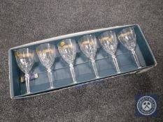 A set of six boxed crystal wine glasses