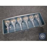 A set of six boxed crystal wine glasses