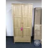 A Bentley Designed oak double door wardrobe fitted a drawer