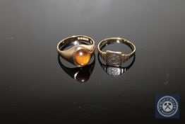 A 9ct gold tiger's eye signet ring and another 9ct gold signet ring CONDITION REPORT: