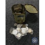 A tin containing a quantity of decimal and pre-decimal British and foreign coins