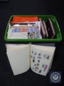 A box containing a large quantity of stamps and first day covers