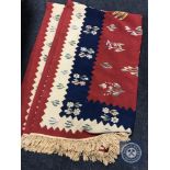 A Moroccan kilim rug 244 cm x 166 cm