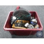 A box of fishing equipment including reels, line, weights,