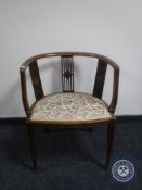 A Victorian inlaid mahogany tapestry seated elbow chair