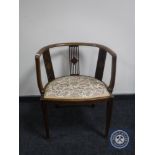 A Victorian inlaid mahogany tapestry seated elbow chair