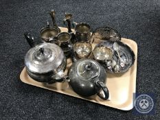 A tray containing 20th century plated wares including a three-piece plated tea service retailed by